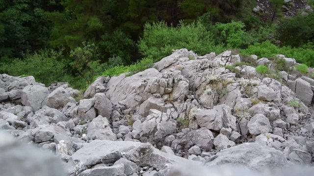 Rock stone landscape with rock pebbles being thrown in Omis Town Croatia country