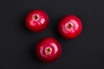 Three ripe bilberry berries