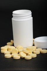 A bottle of B complex vitamin pills