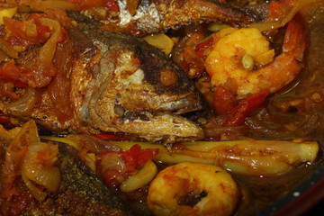 Fish cooked with chillies 
