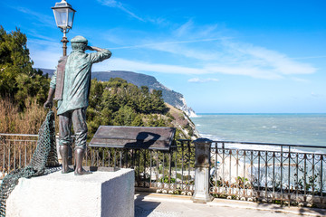Statue of fisherman and Mount Conero - Numana Sirolo Ancona Marche Italy