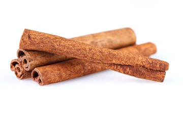 Fragrant cinnamon sticks isolated on white background.