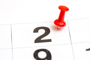 Pin on the date number 2. The second day of the month is marked with a red thumbtack. Pin on...