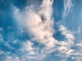 Obraz premium cloudscape with white altocumulus clouds at evening