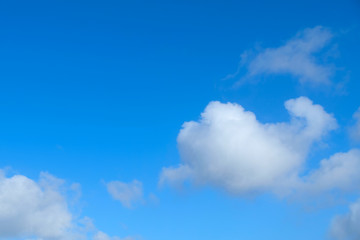 Beautiful blue sky and fluffy cumulus white clouds after European windstorm over the Germany's North Sea islands.