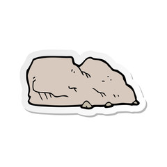 sticker of a cartoon rock