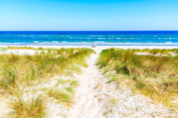 Fototapeta na wymiar View of beach and sand dunes in Lobbe village, Ruegen island, Baltic Sea, Germany