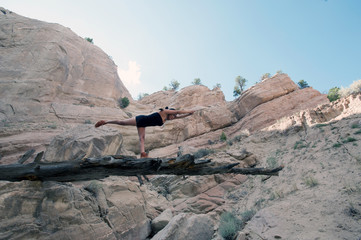 Naklejka premium Native American Yogini In New Mexico Red Canyon Landscape 