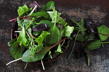 Mixed salads in a bowl. Diet concept