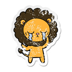 distressed sticker of a crying cartoon lion