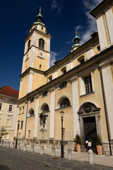 South side of St. Nicholas Catholic church Ljubljana Cathedral with belfry, gothic pieta, door on Cyril Methodius Square Ljubljana Slovenia