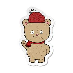 sticker of a cartoon bear in hat