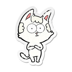 distressed sticker of a happy cartoon cat