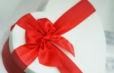 gift with red ribbon and bow