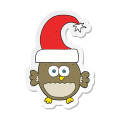 sticker of a cartoon little christmas owl