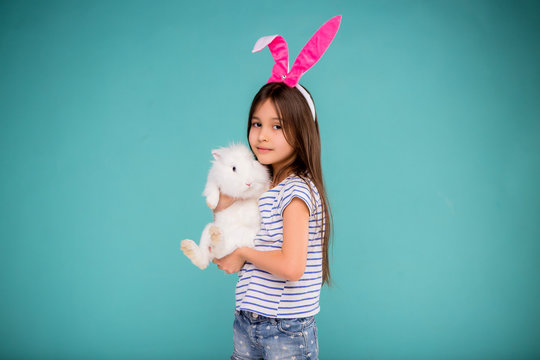 baby girl is a picture of a rabbit, baby girl in rabbit ears