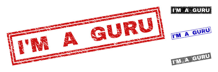 Grunge I'M A GURU rectangle stamp seals isolated on a white background. Rectangular seals with grunge texture in red, blue, black and gray colors.