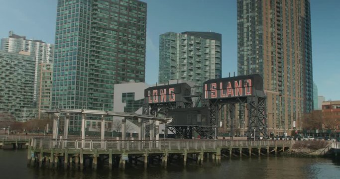 Long Island sign on waterfront dock in Long Island City, Queens.