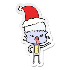 disgusted sticker cartoon of a alien wearing santa hat