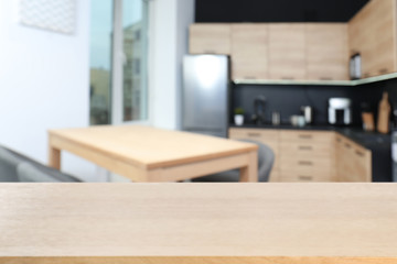 Empty wooden table on white background. Mockup for design
