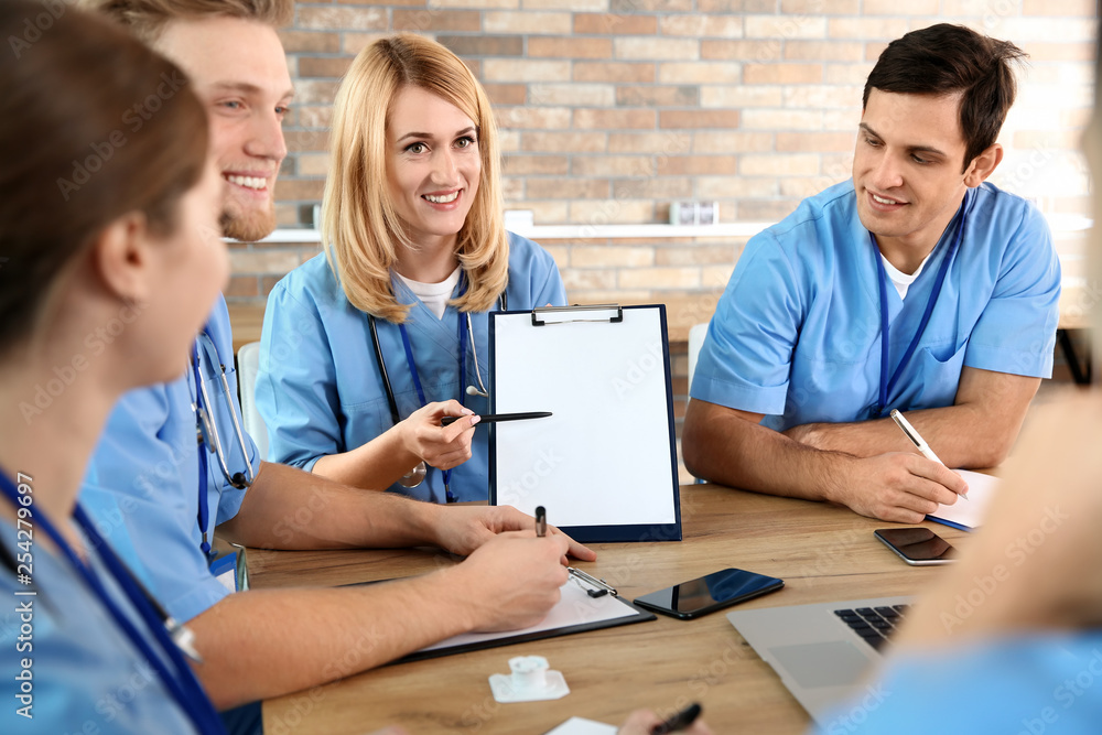 Poster Medical students in uniforms studying at university