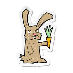 sticker of a cartoon rabbit with carrot