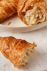 Croissants on the white plate