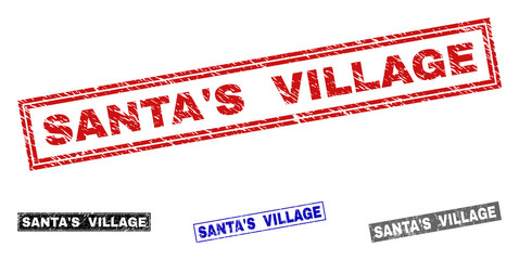 Grunge SANTA'S VILLAGE rectangle stamp seals isolated on a white background. Rectangular seals with grunge texture in red, blue, black and gray colors.