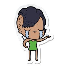 sticker of a cartoon crying girl