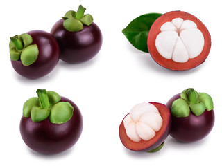 ripe mangosteen with leaves isolated on white background closeup. Set or collection