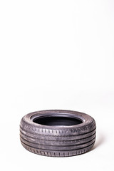 automobile tires on white background. copy space