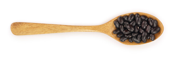 Obraz premium black kidney bean in wooden spoon isolated on white background. Top view. Flat lay
