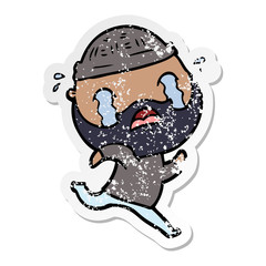 distressed sticker of a cartoon bearded man crying
