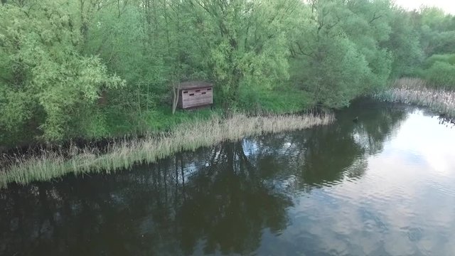 Shot of a bird observation cabin in the woods