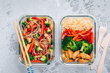 Chicken teriyaki stir fry meal prep containers with broccoli, carrots, rice or soba noodles