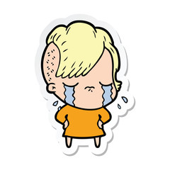 sticker of a cartoon crying girl