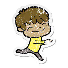 distressed sticker of a cartoon happy boy