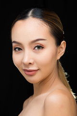 Fototapeta premium Asian Woman after applying make up hair style