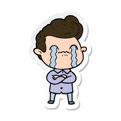 sticker of a cartoon man crying