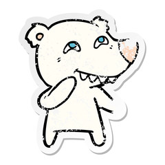 distressed sticker of a cartoon polar bear showing teeth
