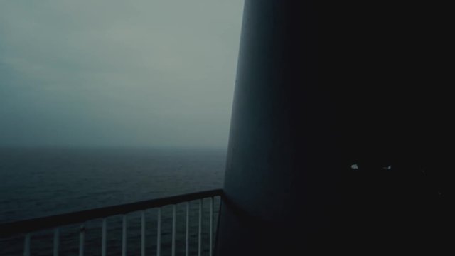 Filming a ship in the midle of the ocean, with a lot of fog.
