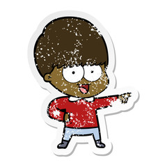 distressed sticker of a happy cartoon boy pointing