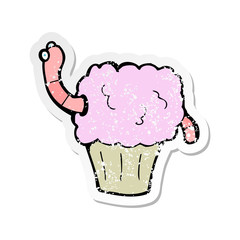 retro distressed sticker of a cartoon worm in cupcake