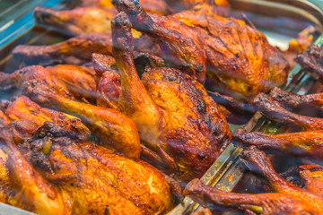 Roasted chicken on supermarket display
