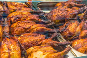 Roasted chicken on supermarket display