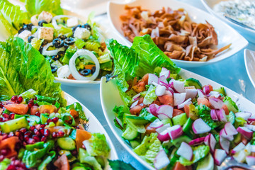 Assortment of fresh vegetable salads in restaurant buffet