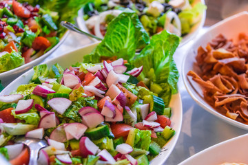 Assortment of fresh vegetable salads in restaurant buffet