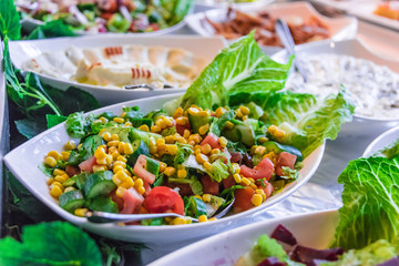 Assortment of fresh vegetable salads in restaurant buffet