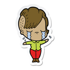 sticker of a cartoon crying girl