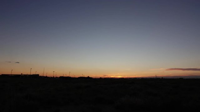 Twilight sky after sunset over landscape.